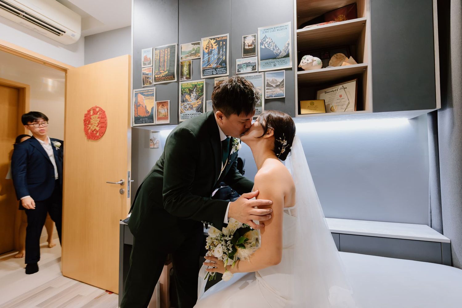 Interior hallway decorated for a wedding with orange lanterns and wall decorations.