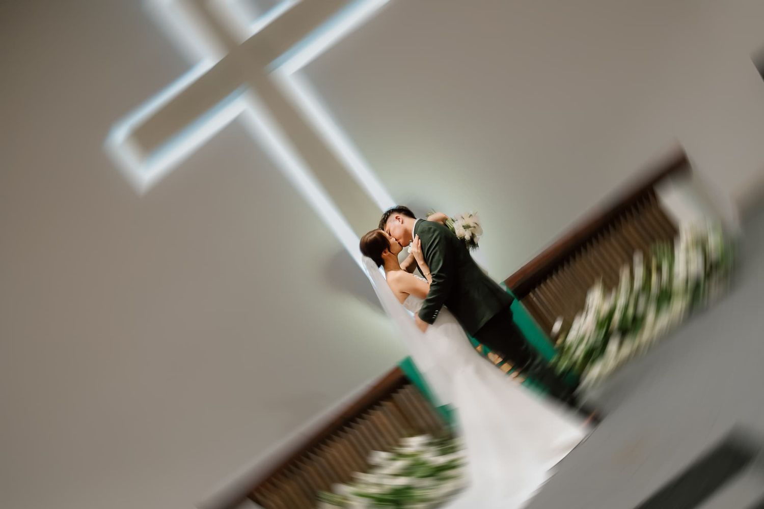 Abstract blurred shot of a church wedding ceremony with dramatic lighting.