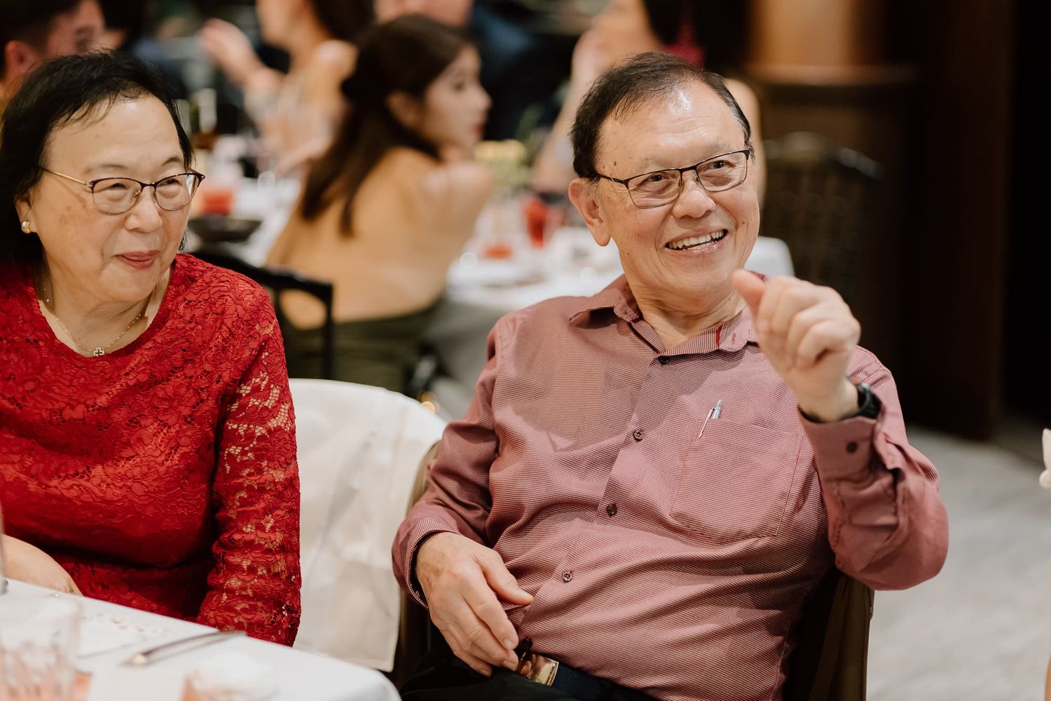 Wedding guests enjoying the reception dinner festivities.