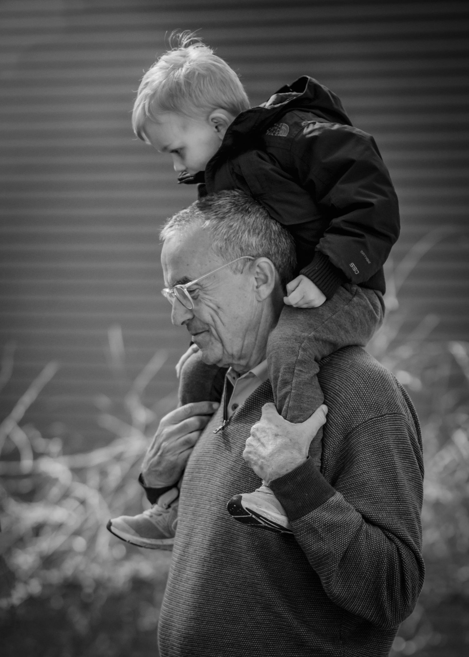 Man with child on his shoulders