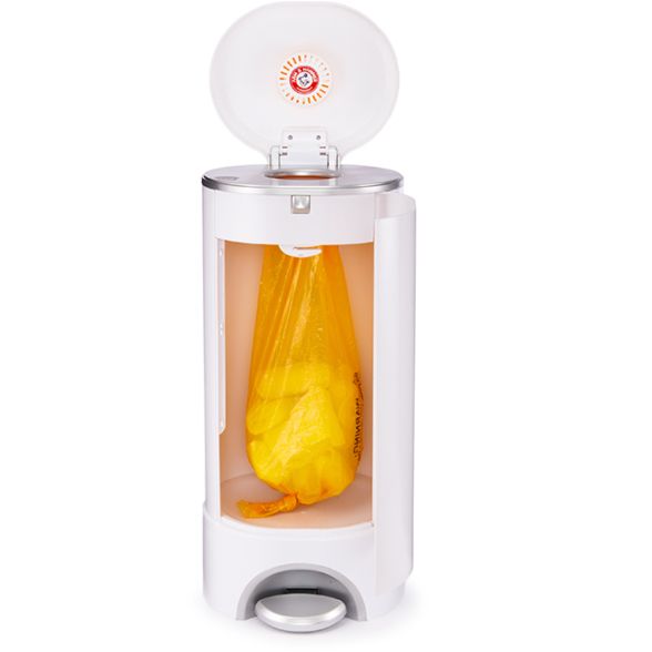 Clear plastic bottle sterilizer with orange UV light for sanitizing baby items.