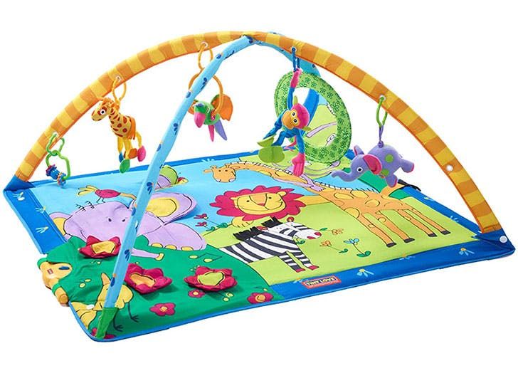 Colorful jungle-themed baby play mat with hanging toys and animal designs for infant entertainment.