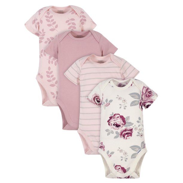 Four pink baby bodysuits with floral prints and stripe patterns in coordinating colors.