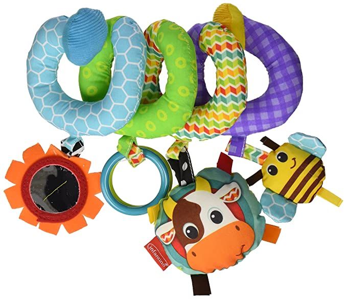 Colorful spiral baby toy with plush animal attachments and textured patterns.