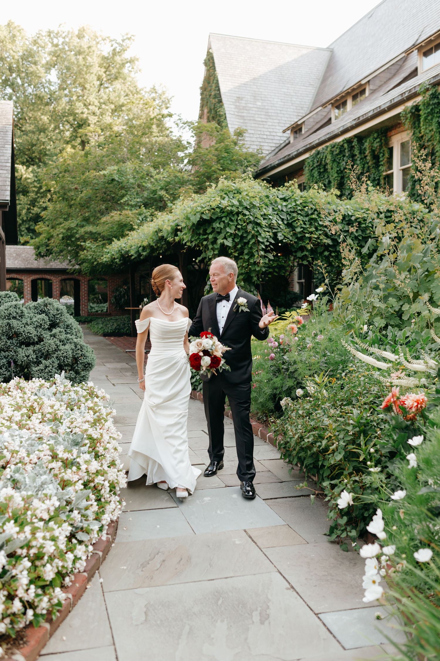 the american club in kohler, wisconsin featuring a courtyard summer wedding.