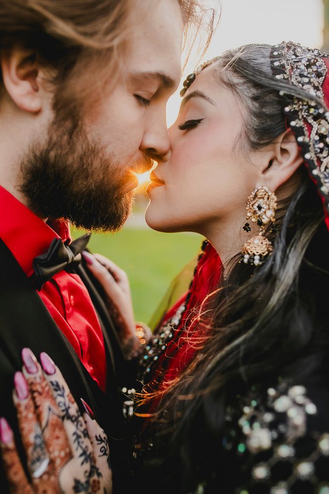Romantic close-up portrait sequence showing couple kissing outdoors with sunlit glow and delicate floral details.