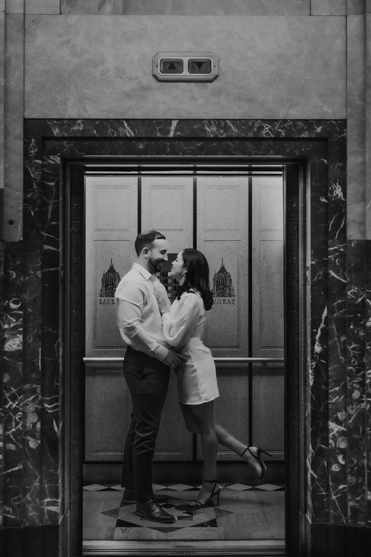 A sequence of black and white photographs showing a couple dancing together in an elevator.