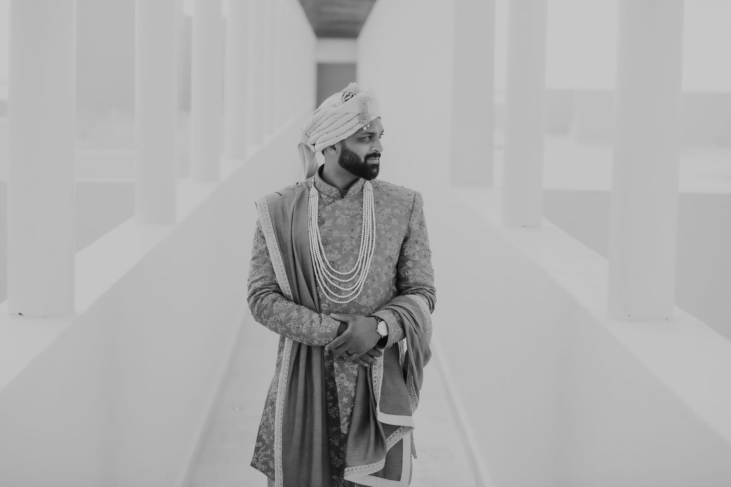 Vintage black and white portrait of a nobleman wearing ornate traditional Indian dress with turban and jewelry. Windsor/essex and destinatio