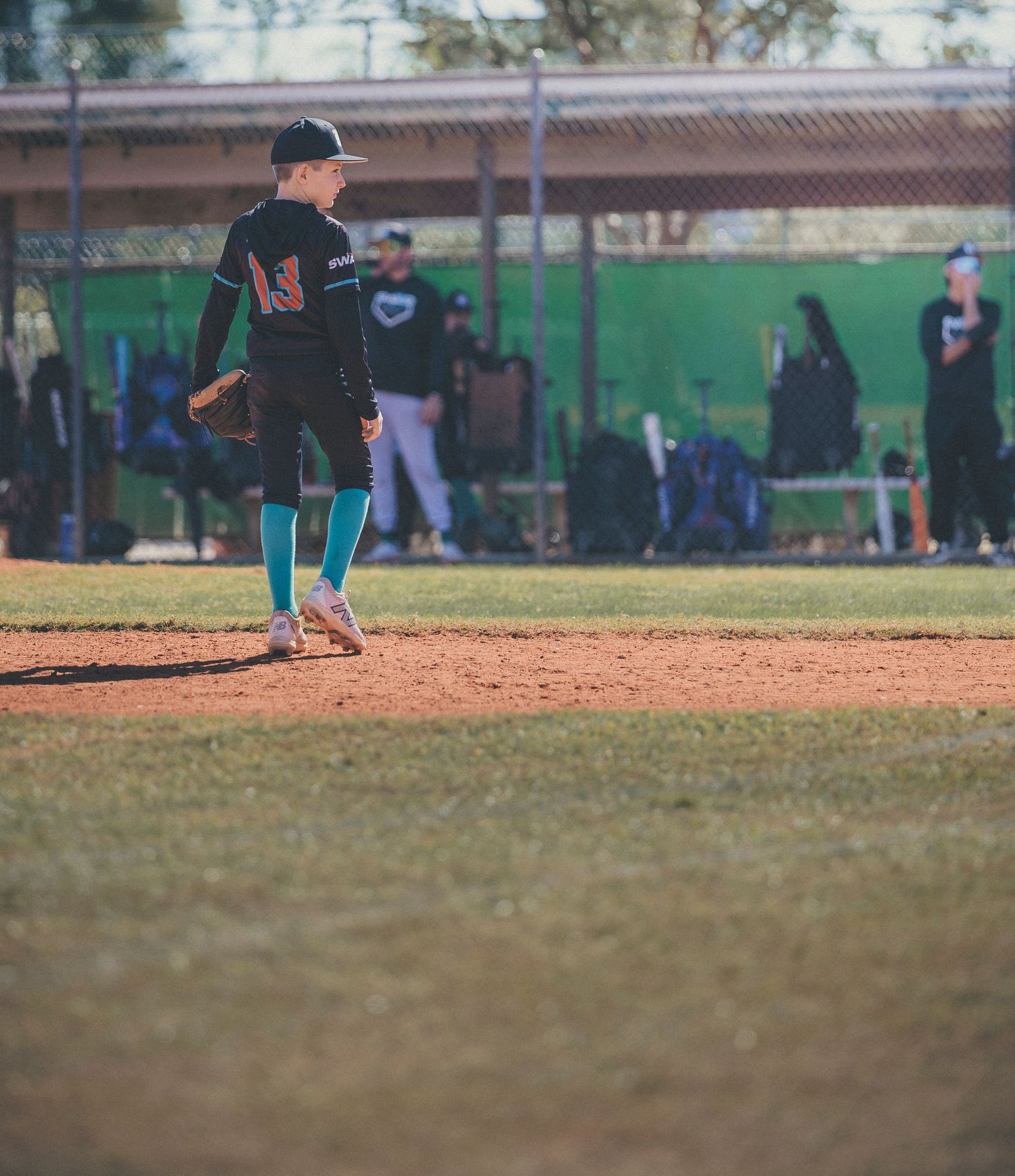 Wide angle view of baseball field showing players in position during gameplay.