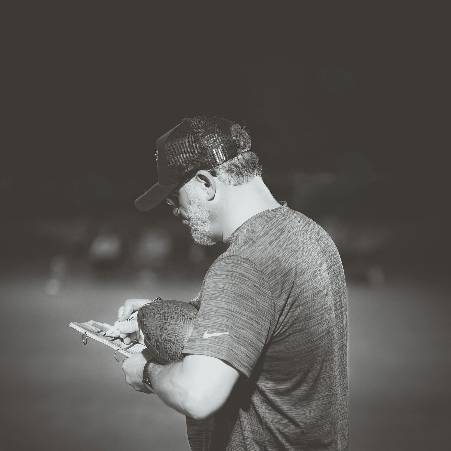 Black and white sequence of a person practicing shooting techniques.