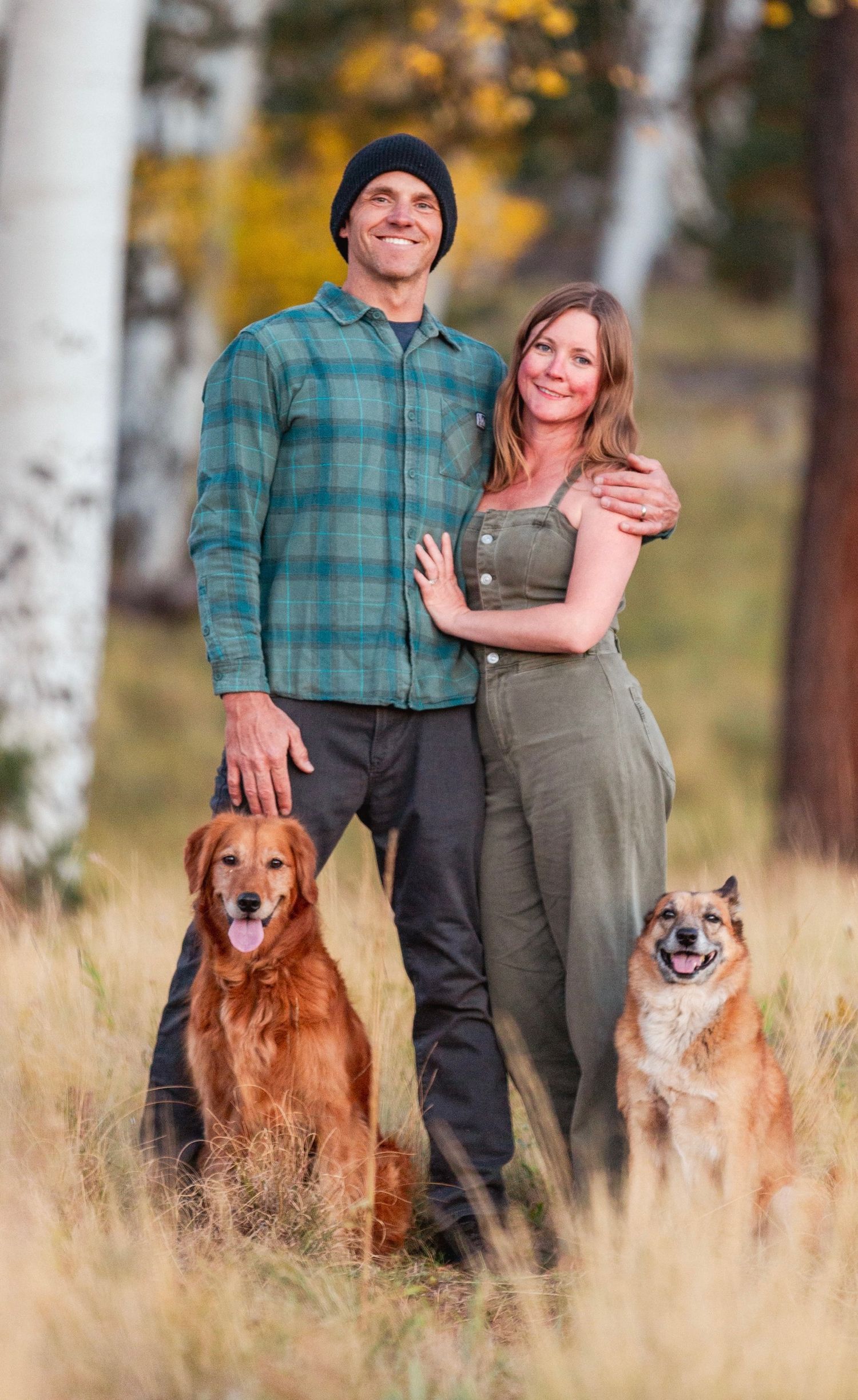 David White the flagstaff photographer with his wife and two dogs in Flagstaff, Arizona during fall in the aspen forest