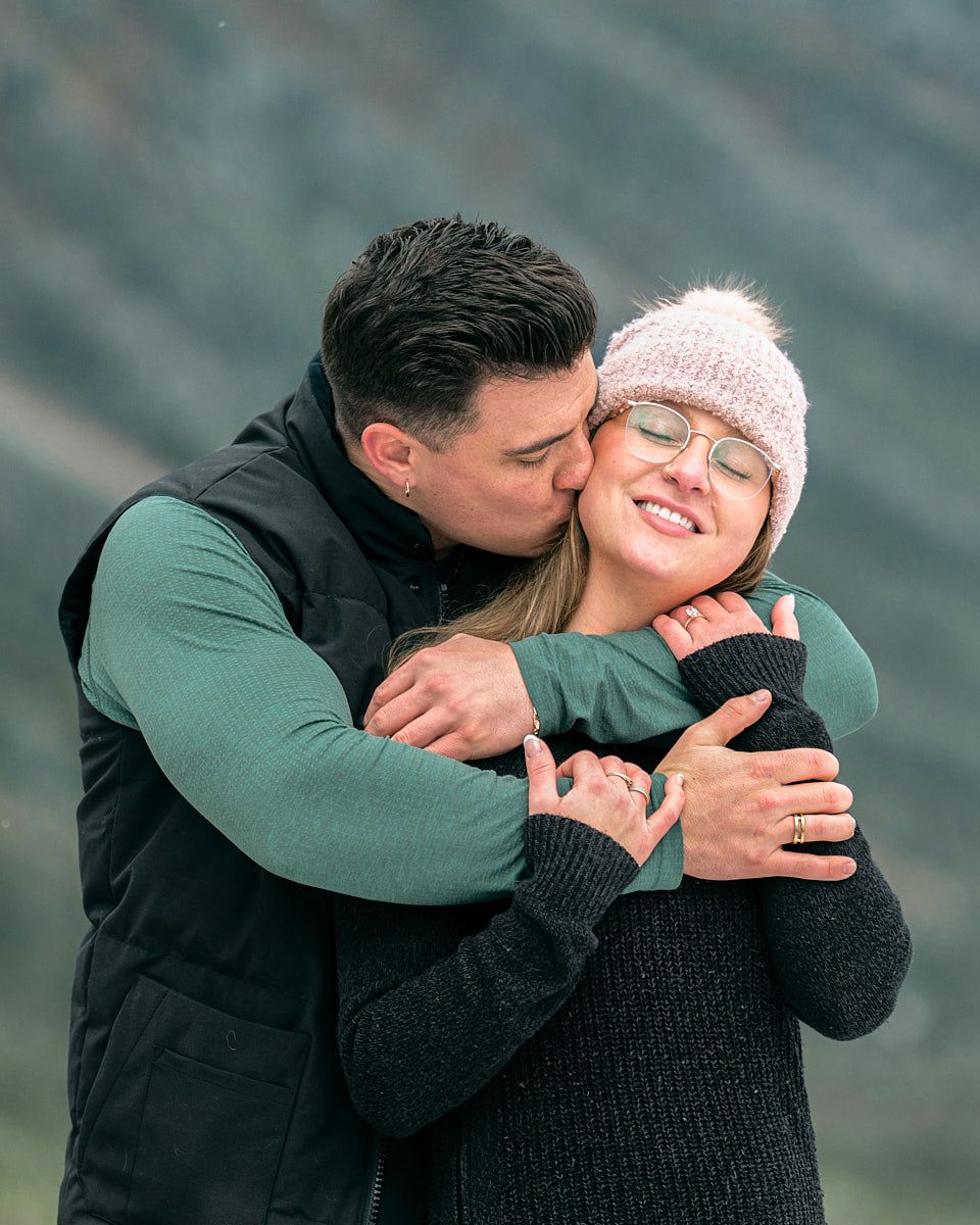 Romantic engagement proposal photoshoot in Canadian mountains