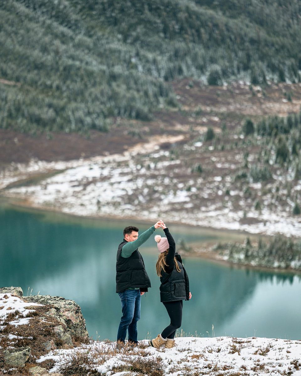 Romantic engagement proposal photoshoot in Canadian mountains
