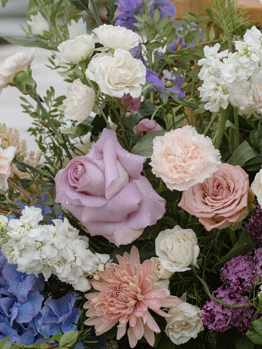 Romantic outdoor wedding ceremony with flowers, capturing beautiful Riga ceremony setting
