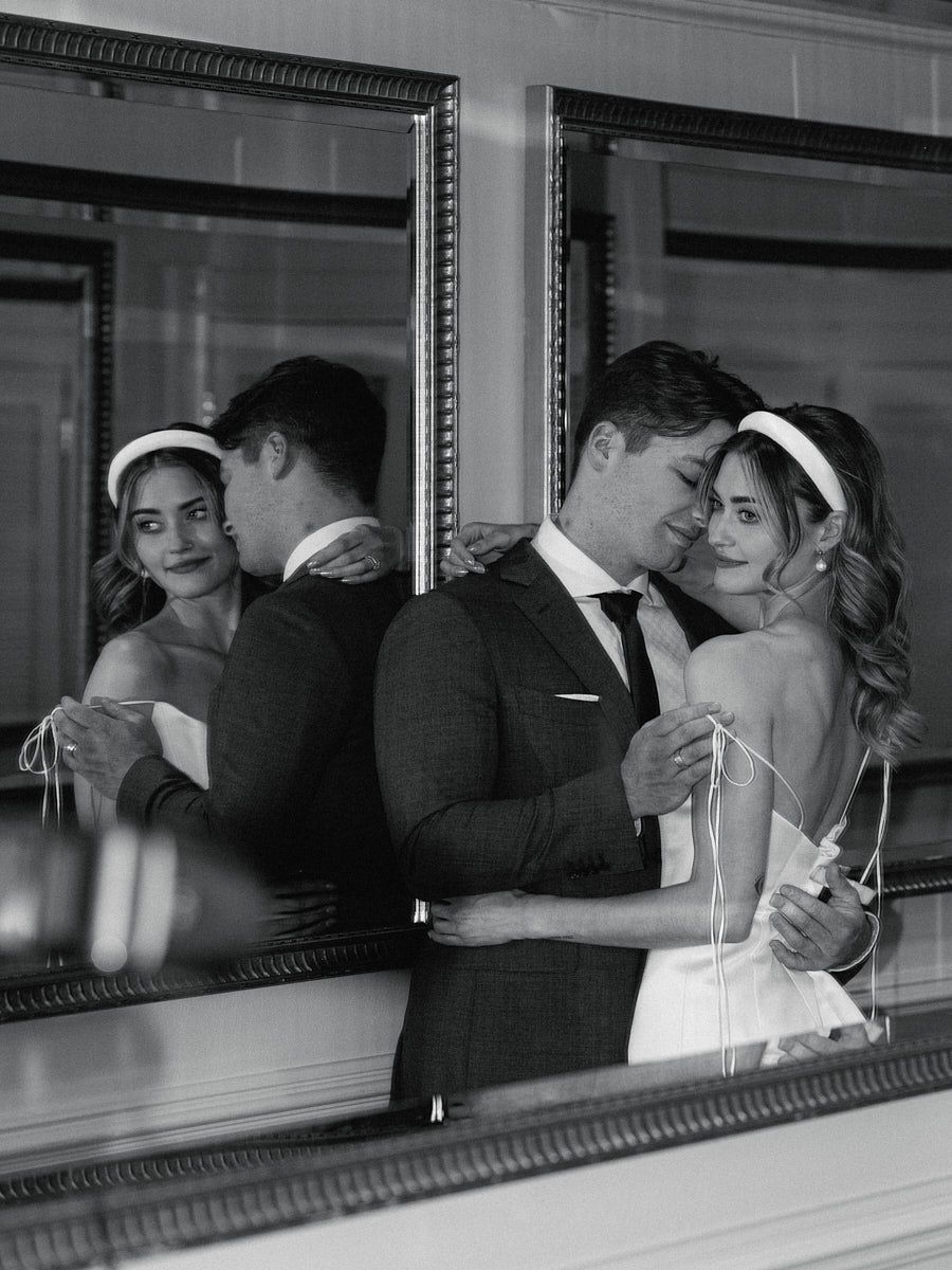 Happy bride and groom in Vecrīga, intimate wedding portrait