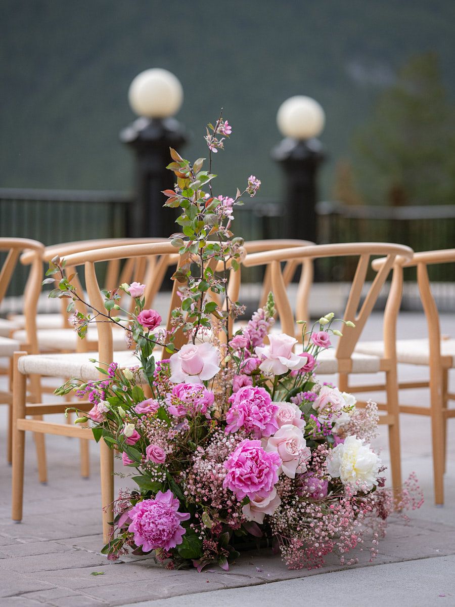 Elegant floral decorations for wedding ceremony, enhancing Riga outdoor wedding ambiance