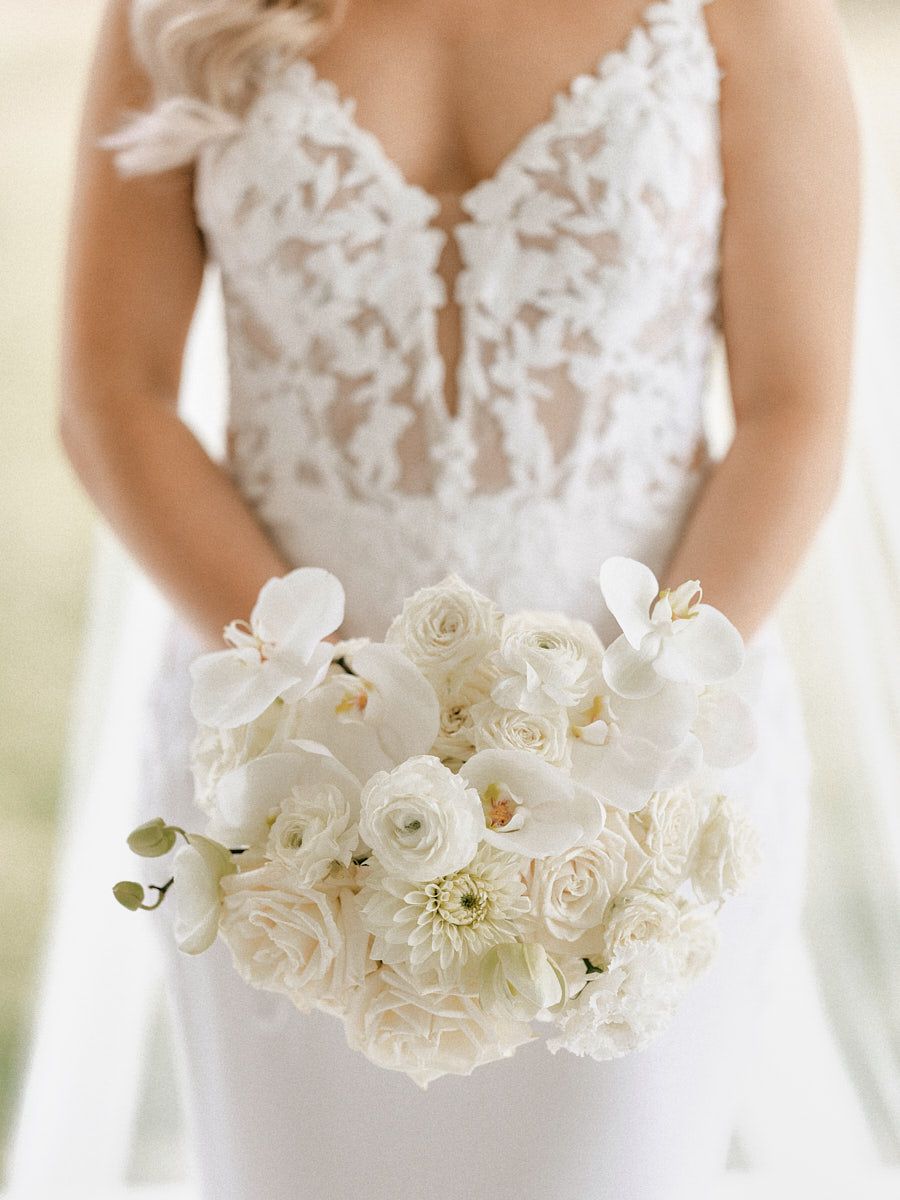 A lush bridal bouquet with soft pastel flowers and greenery, perfect for an elegant wedding in Latvia