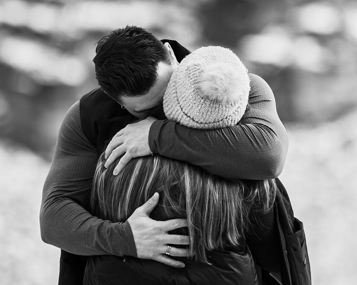Romantic engagement proposal photoshoot in Canadian mountains
