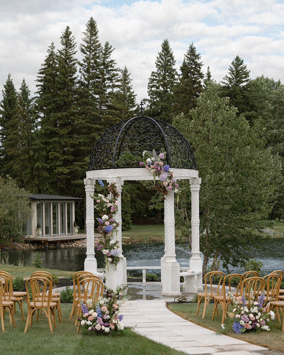 Scenic floral-decorated gazebo for wedding ceremony, perfect European wedding inspiration