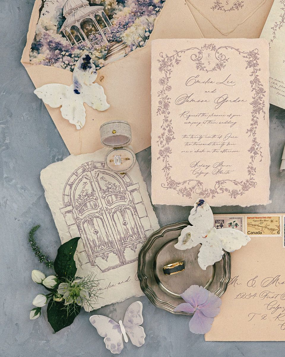 Elegant wedding flat lay with rings, stationery, and decor, showcasing Riga wedding style