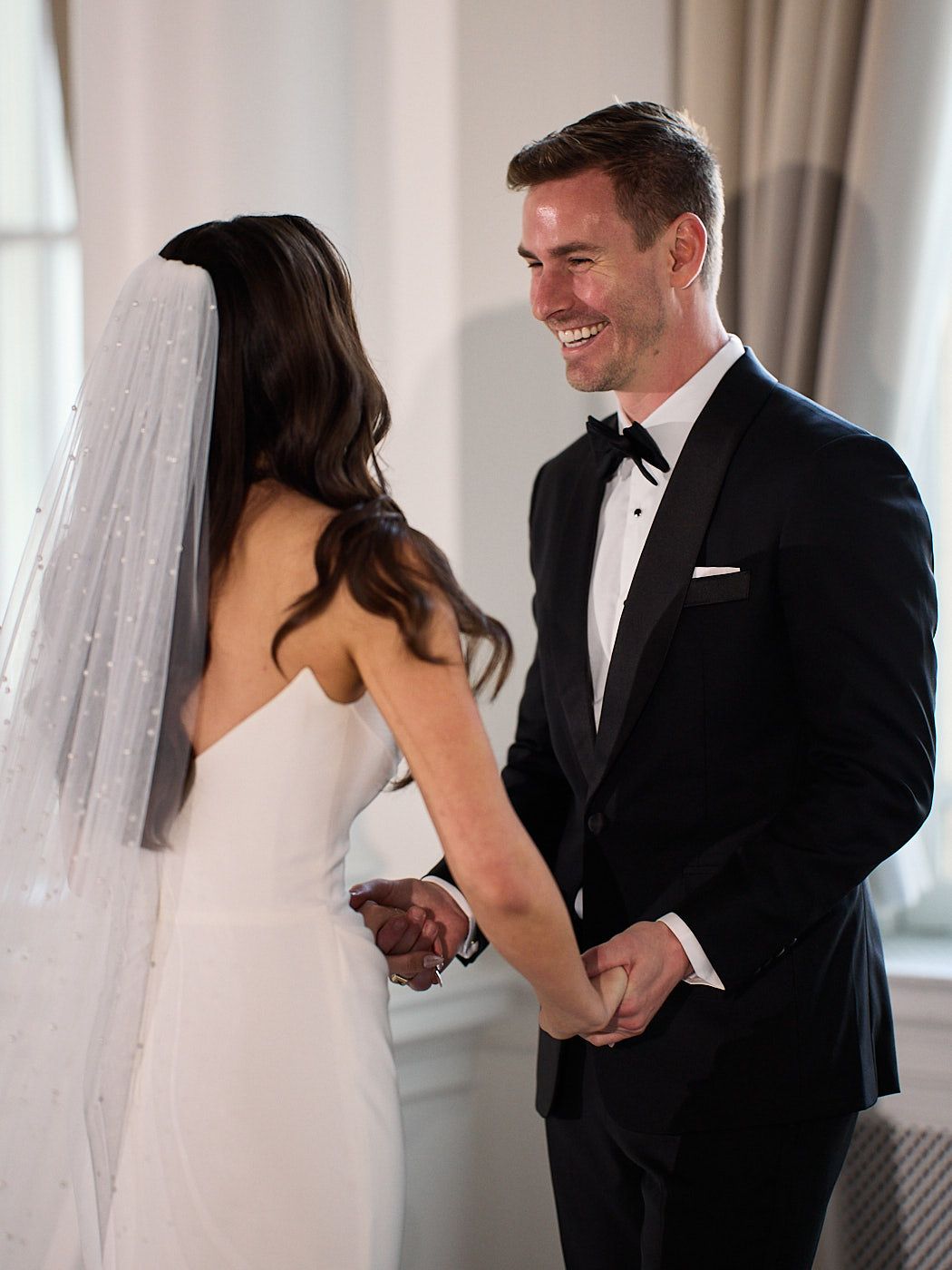 Emotional first look moment at a Riga luxury wedding