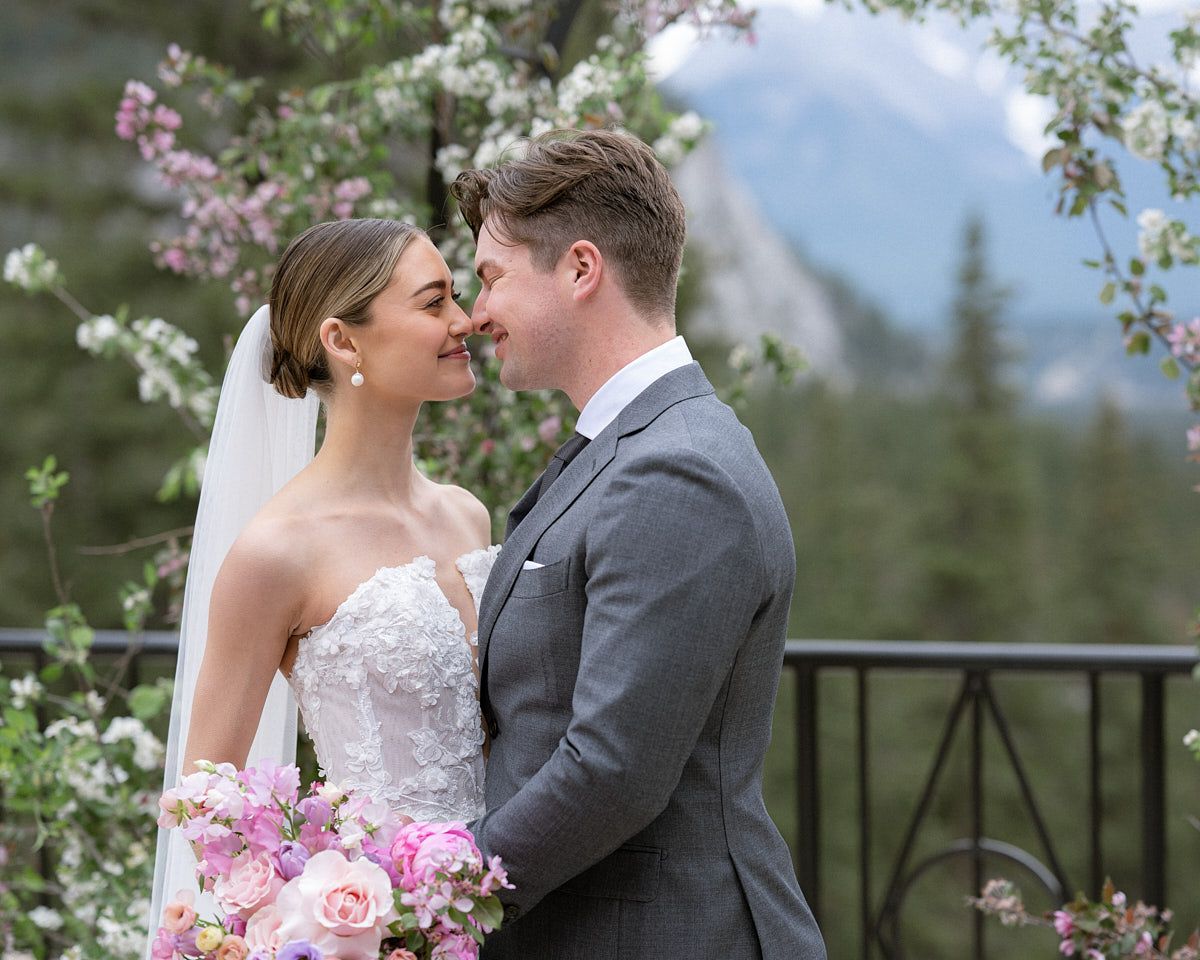 Tender nose-to-nose moment between bride and groom, highlighting intimate Riga wedding emotions
