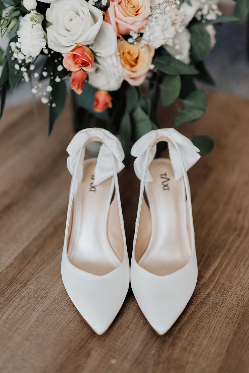 TAXI bridal shoes styled for modern Riga wedding photography