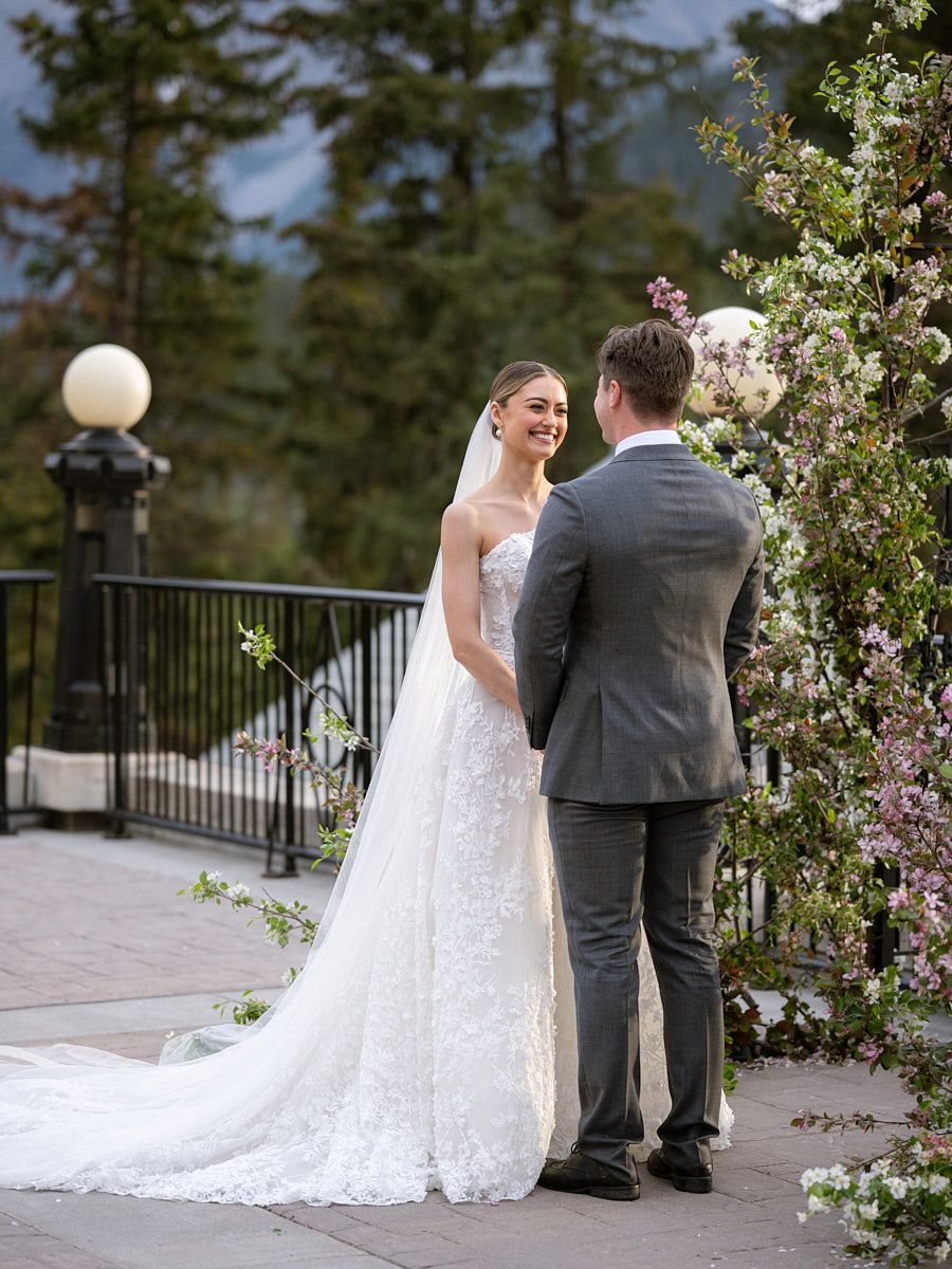 Outdoor wedding ceremony with bride and groom, celebrating love in a scenic Riga setting