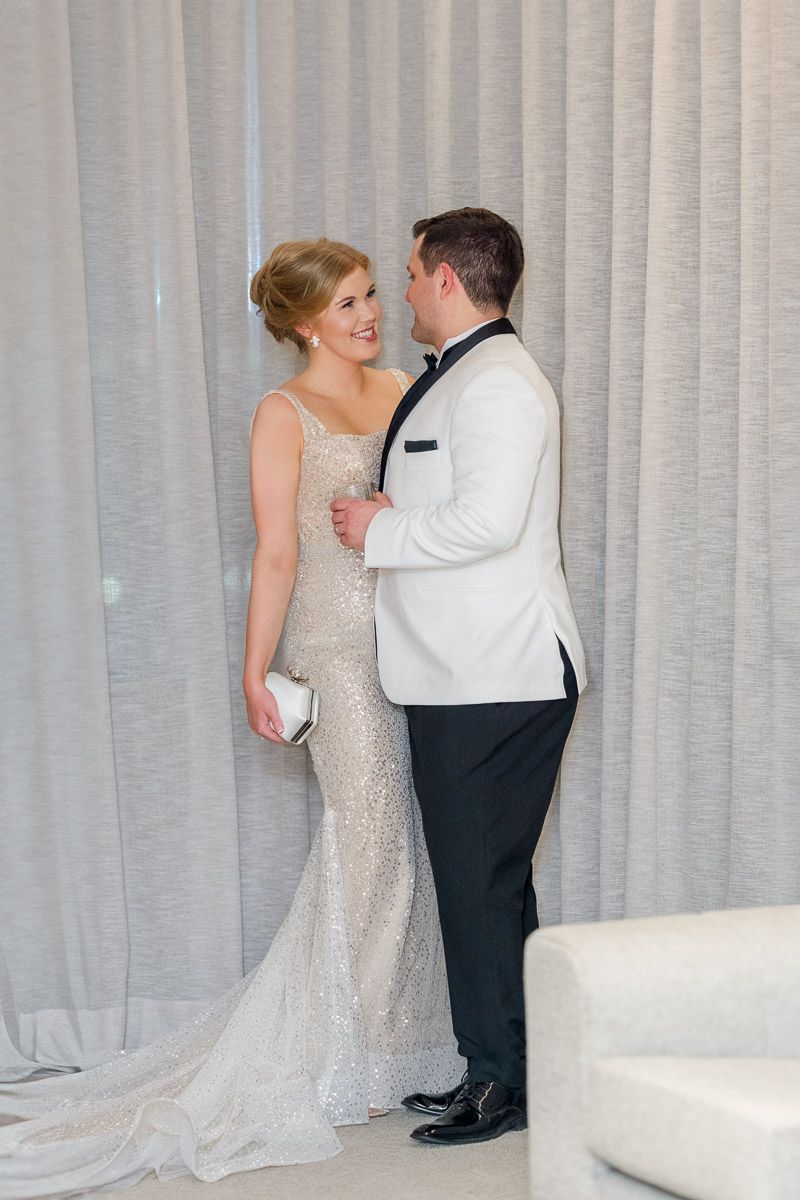 Bride and groom sharing a quiet moment during JM Hotel wedding reception in Riga