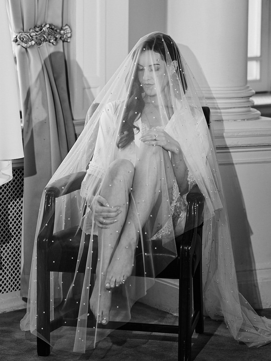 Bride getting ready at a luxury hotel wedding in Riga