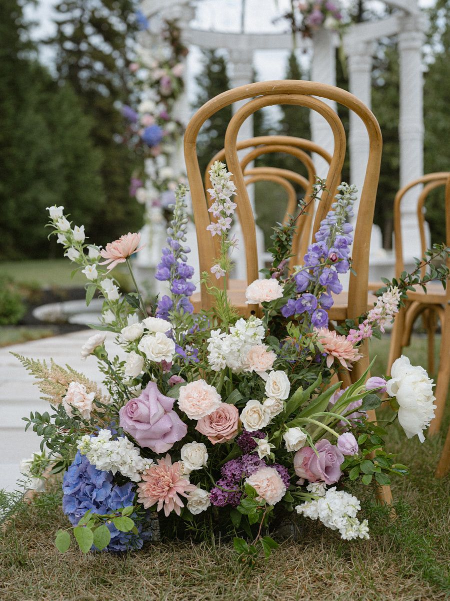 Romantic outdoor wedding gazebo with flowers, capturing beautiful Riga ceremony setting