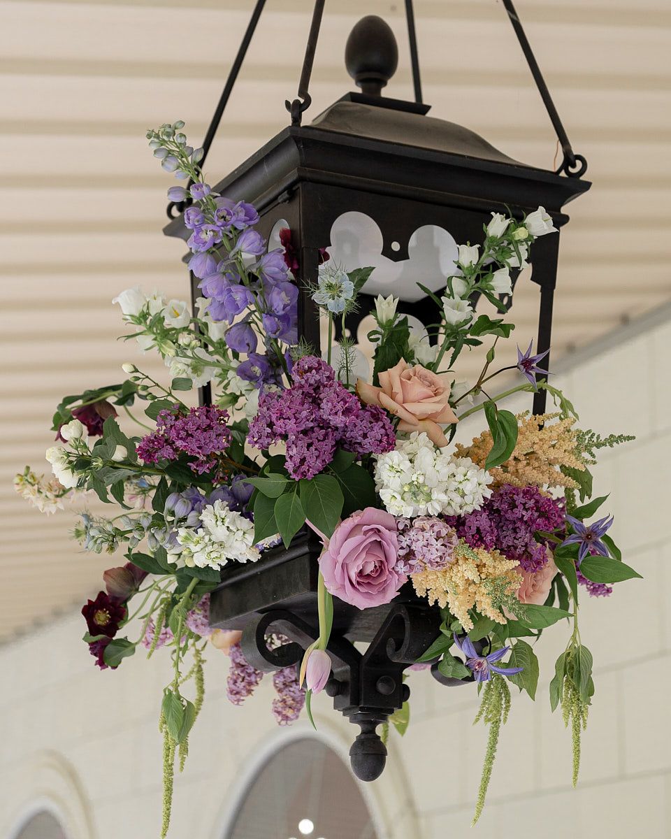 Wedding lamp adorned with delicate floral decorations, enhancing Riga wedding ambiance