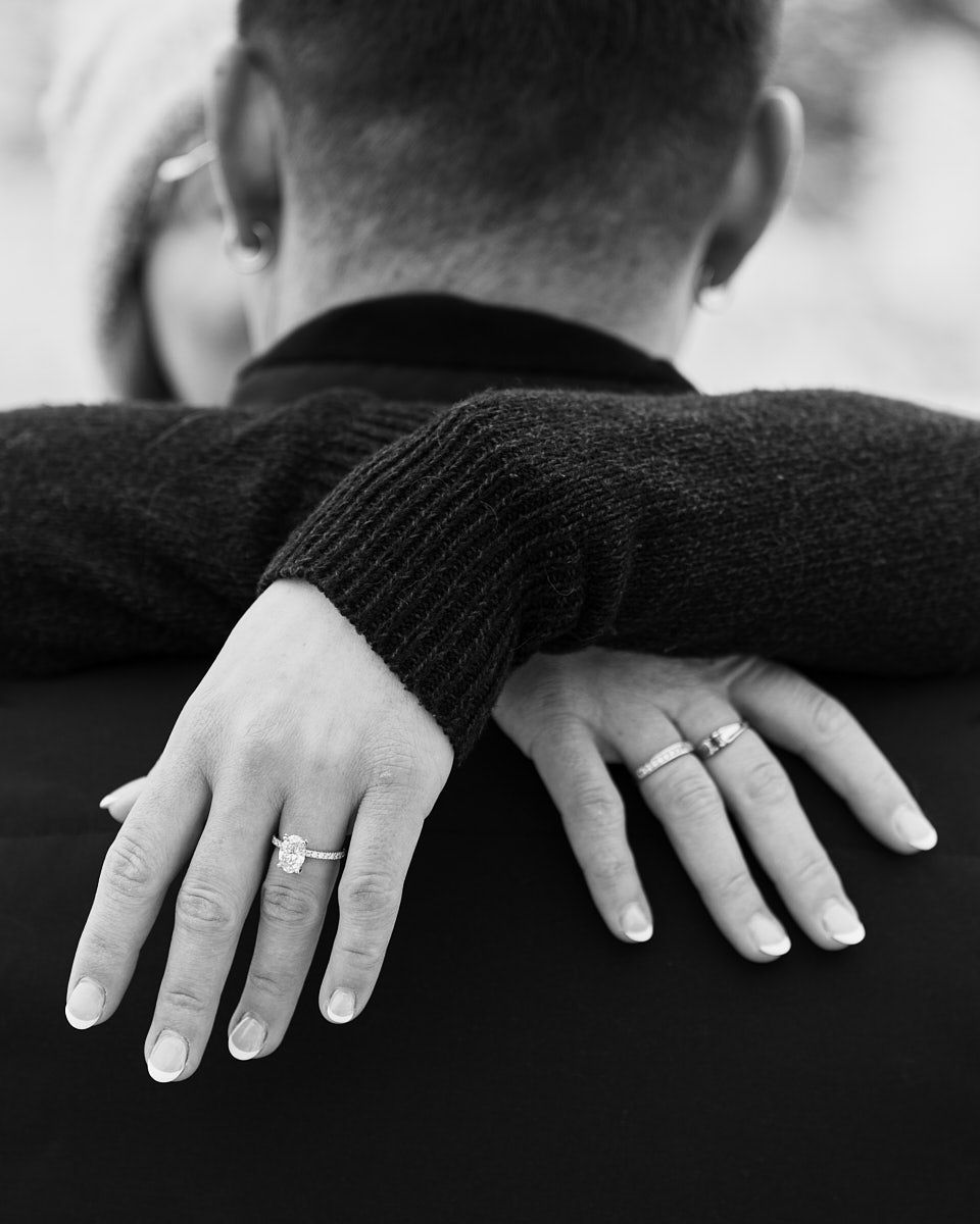 Diamond engagement ring on fiancée’s hand, close-up engagement detail in Riga