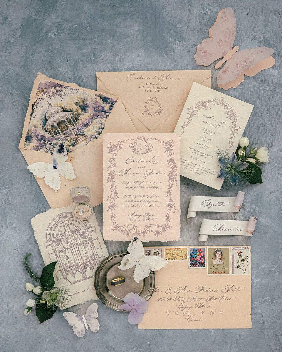 Wedding flat lay featuring invitations, rings, and decorative details, perfect for Riga wedding inspiration