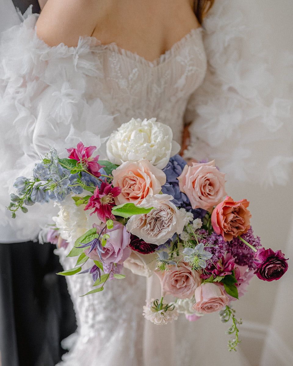 Soft pastel bridal bouquet with delicate flowers, perfect for Riga wedding photography