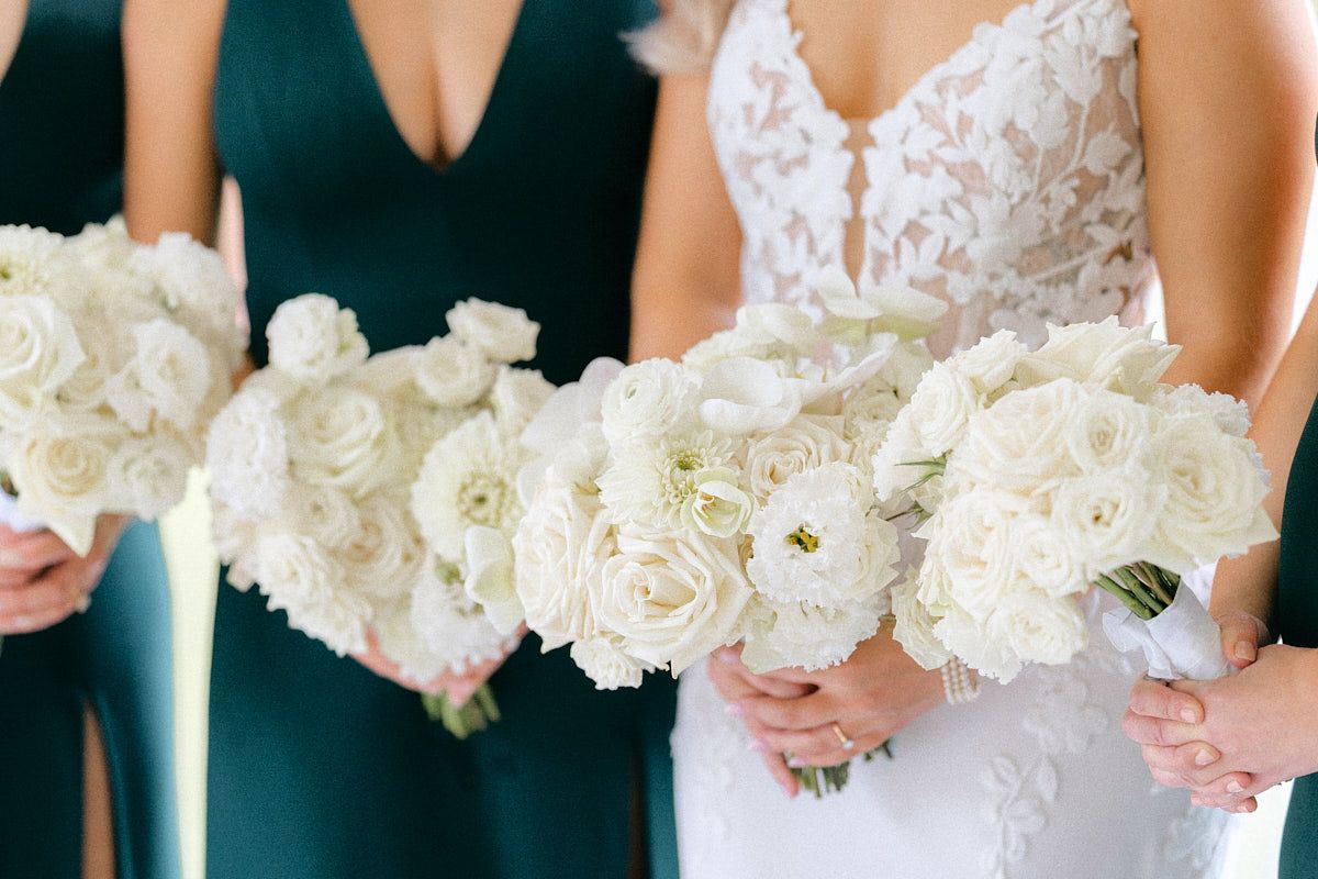Elegant bride and bridesmaid bouquets, showcasing coordinated floral arrangements for Riga weddings