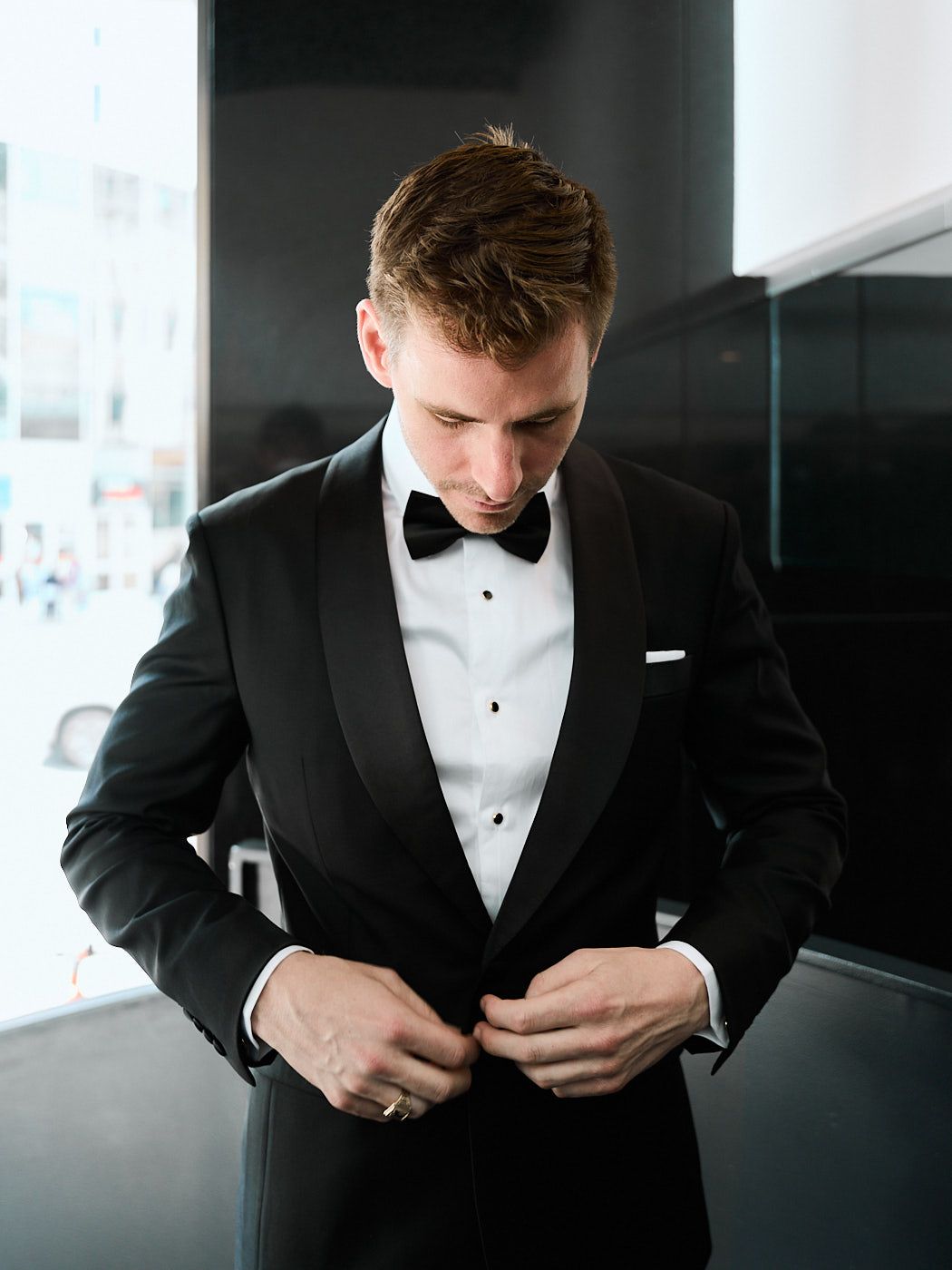 Groom getting ready at a stylish Riga wedding
