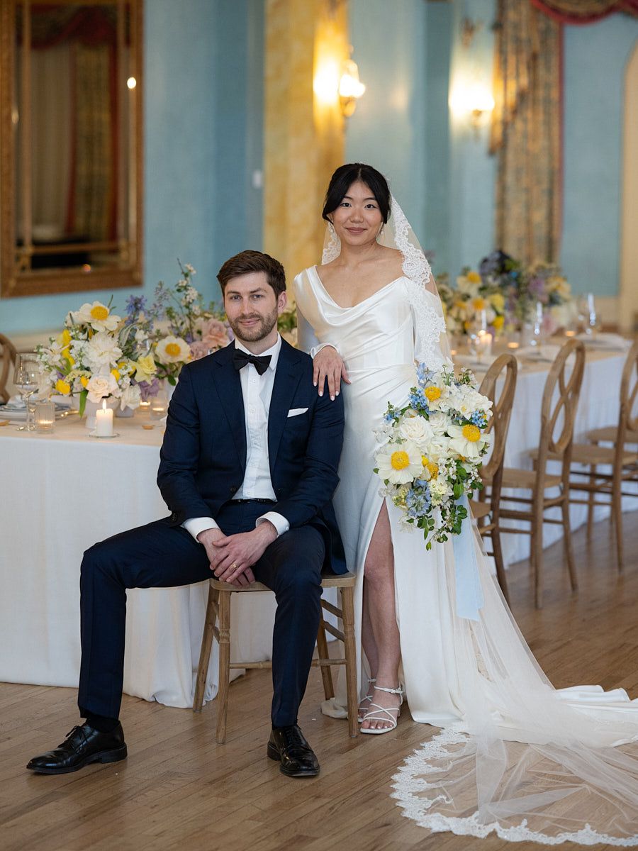 Stunning wedding couple posing in a historic castle for elegant Riga wedding ideas