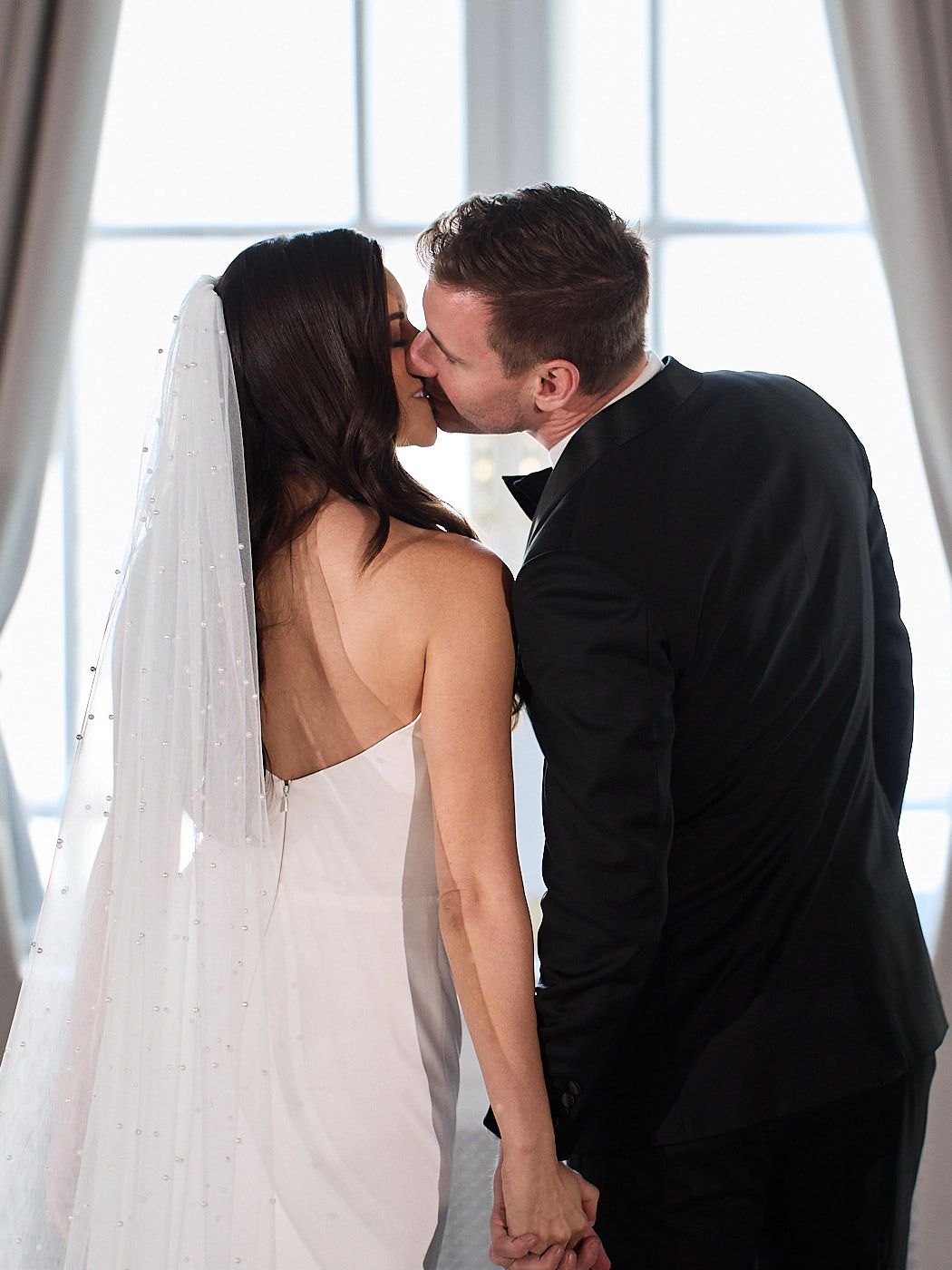 Modern couple portraits at a Riga hotel wedding