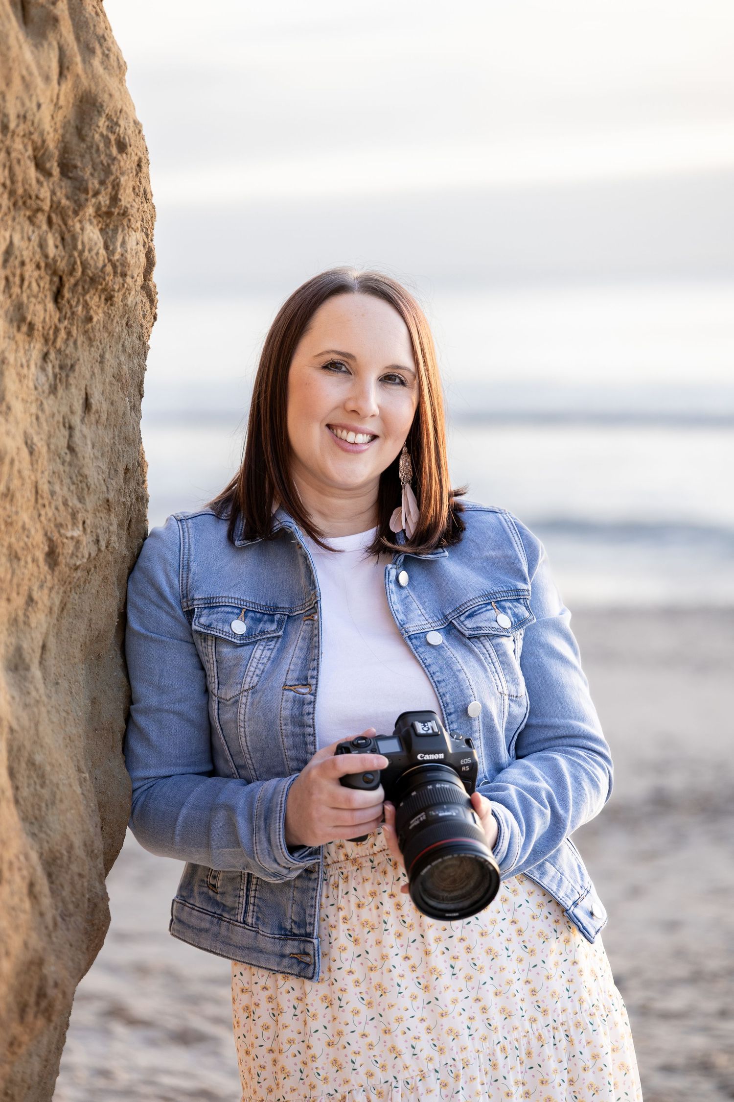 Professional headshot of Adelaide photographer smiling.