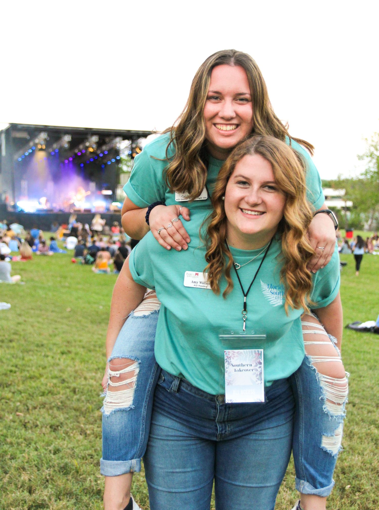 Person in turquoise t-shirt and ripped jeans poses outdoors at multiple angles during a sunny day.