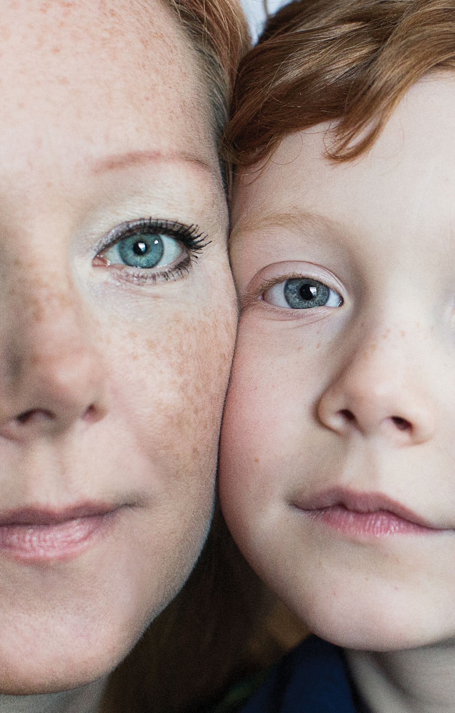 Photo of red haired boy and mother.