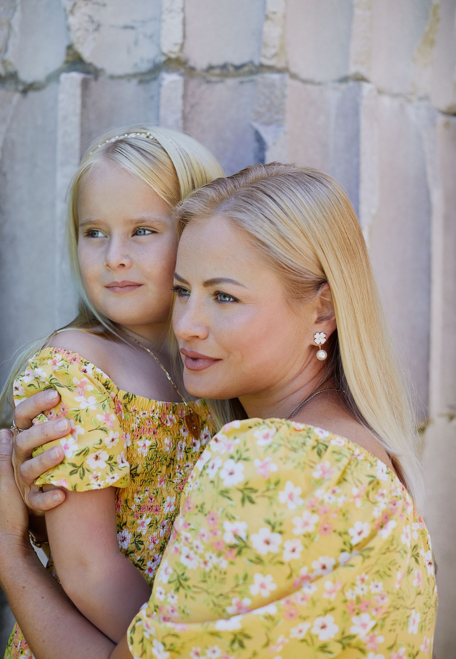 Mother and daughter photo in matching dresses.