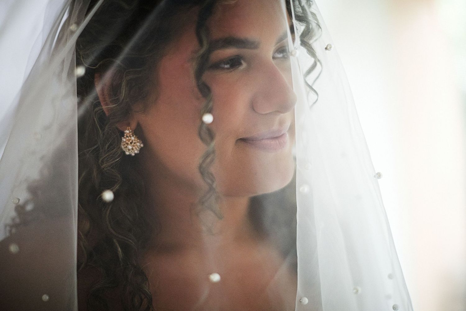 Bride posing for pre-wedding portraits.