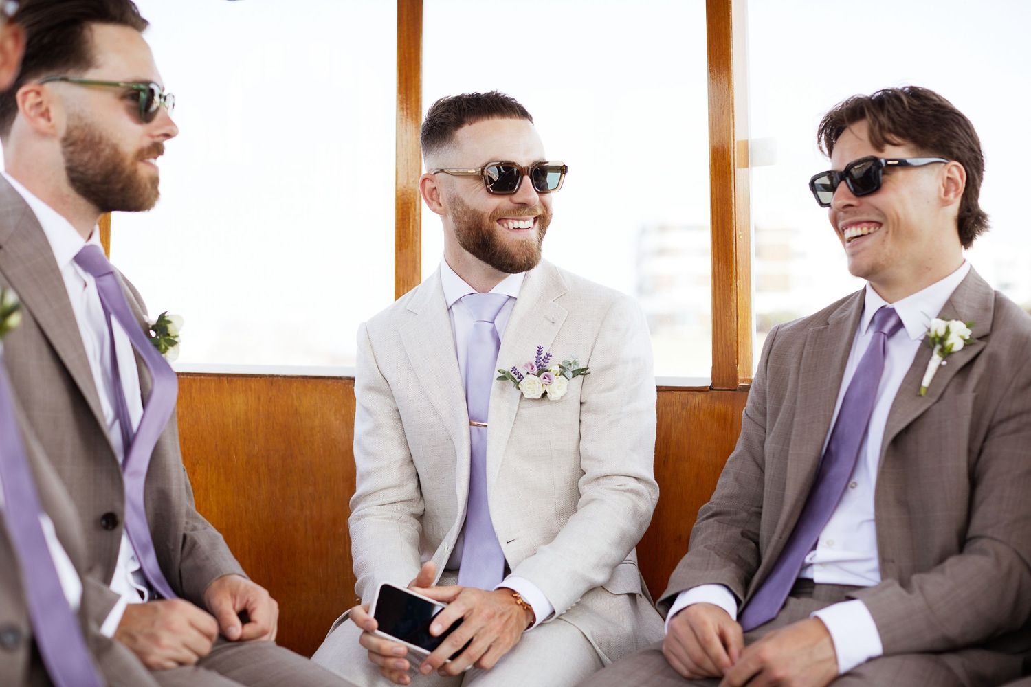 Portrait of groom and grooms brothers.