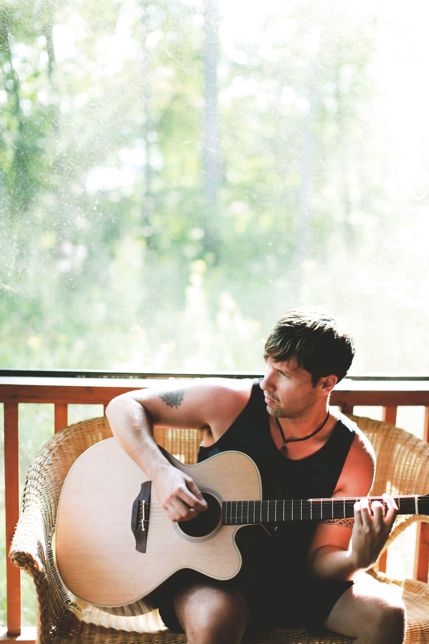 Man playing guitar.