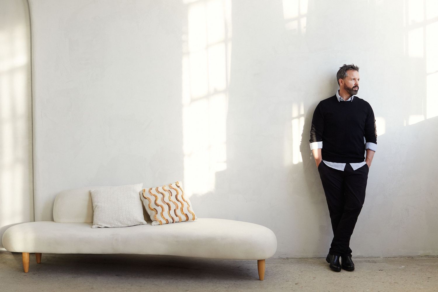 Branding image of man in studio space.