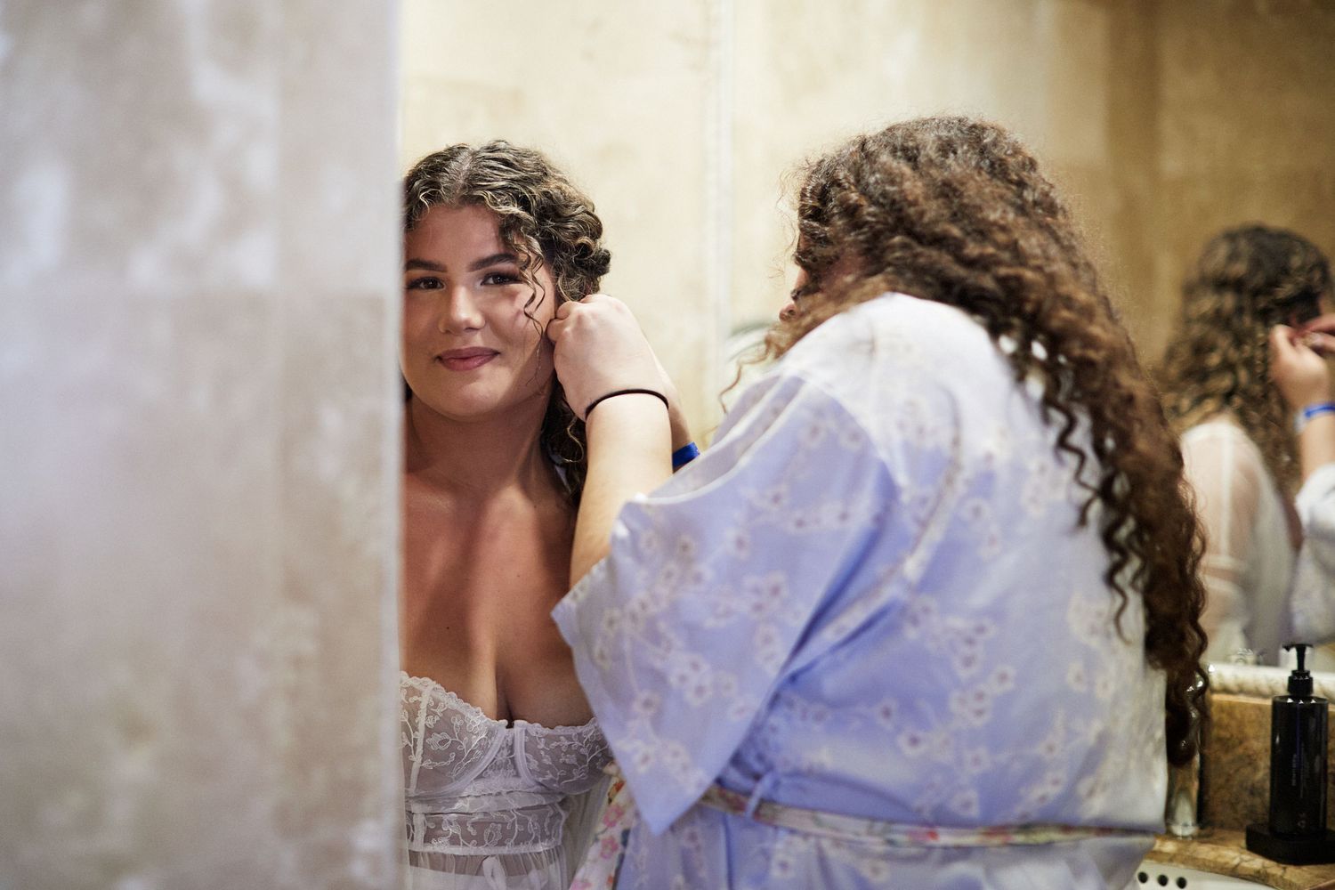 Bride posing for pre-wedding portraits.