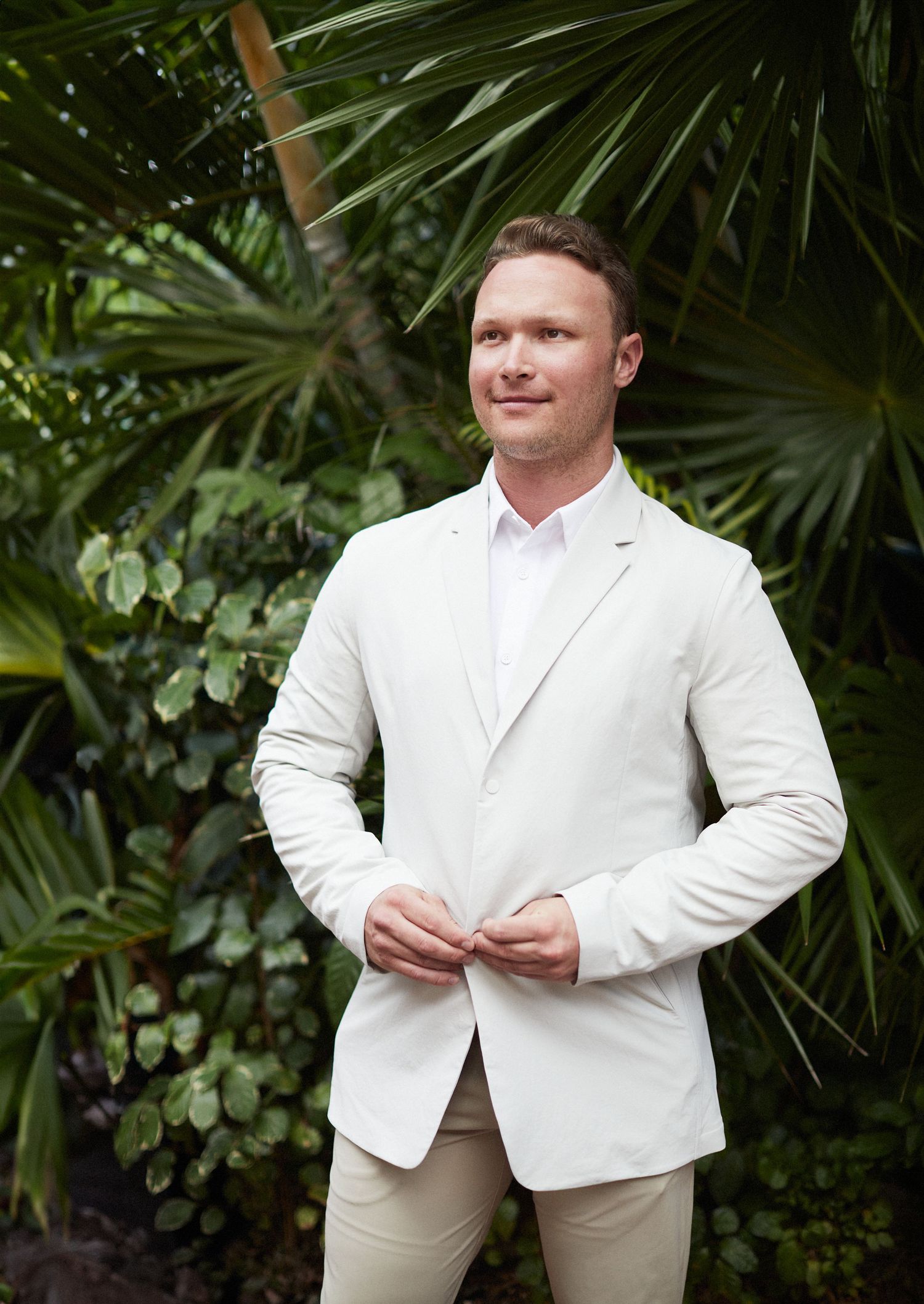 Groom posing for pre-wedding portraits.