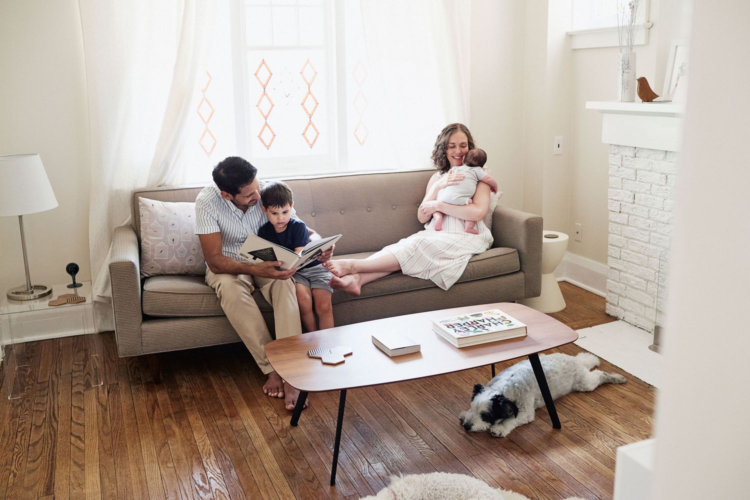 Natural photo of family in living room.